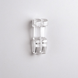 Pince transparente utilisable sur toutes les grilles