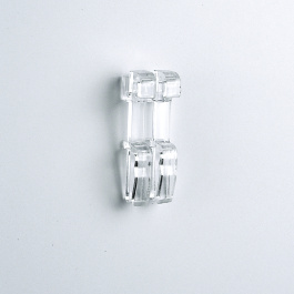 Pince transparente utilisable sur toutes les grilles